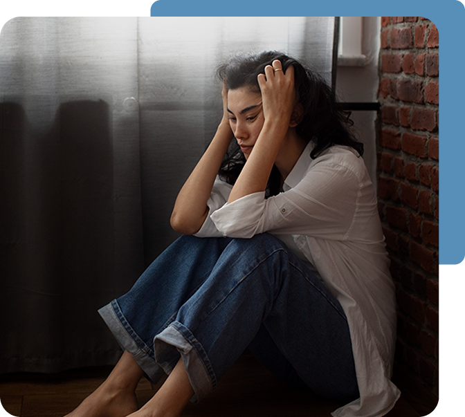 Woman struggling with intrusive thoughts, highlighting the need for OCD and PTSD Treatment in Valencia, Calabasas & Lancaster, CA